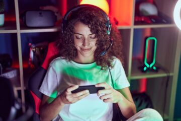 beautiful-woman-streamer-playing-video-game-using-smartphone-gaming